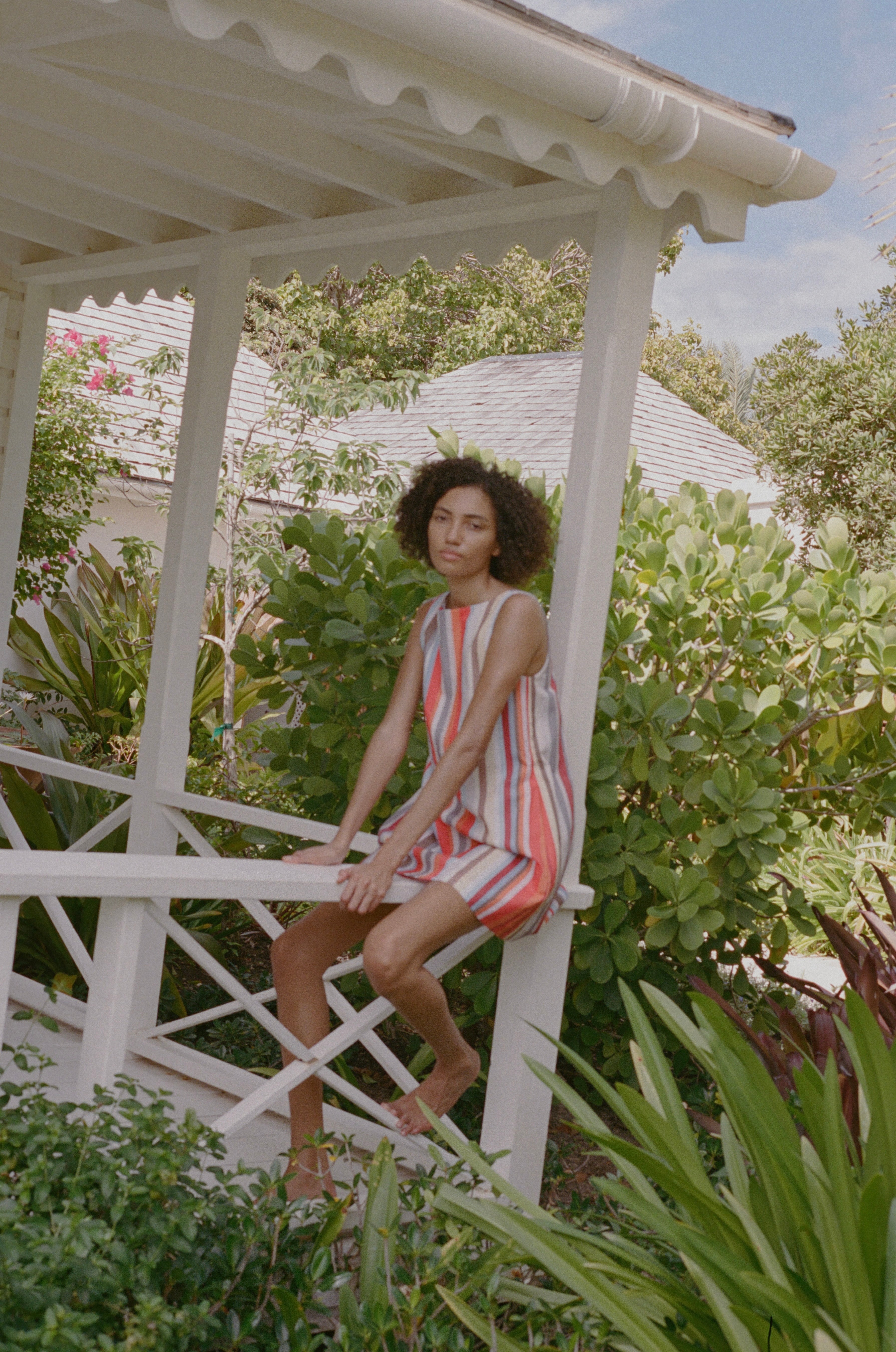 Pleated-Back Mini Dress in Vibrant Stripe